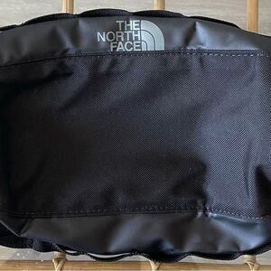 Small black North Face travel bag